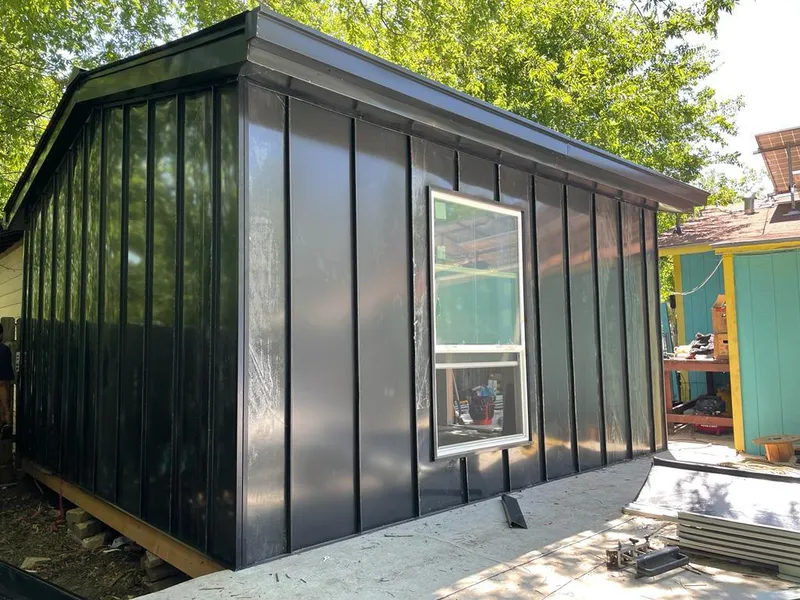 Black standing seam metal wall panels for Metal Roof Installation in Palermo