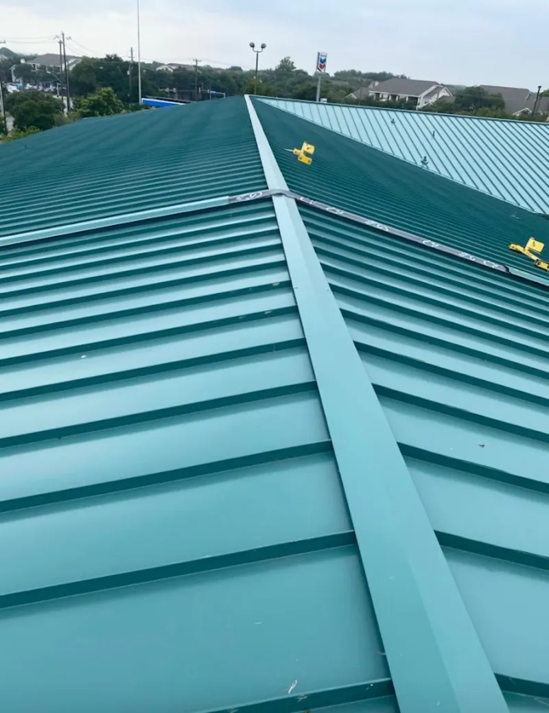 Green commercial metal roof ridge and valley for Metal Roof Repair in Palermo